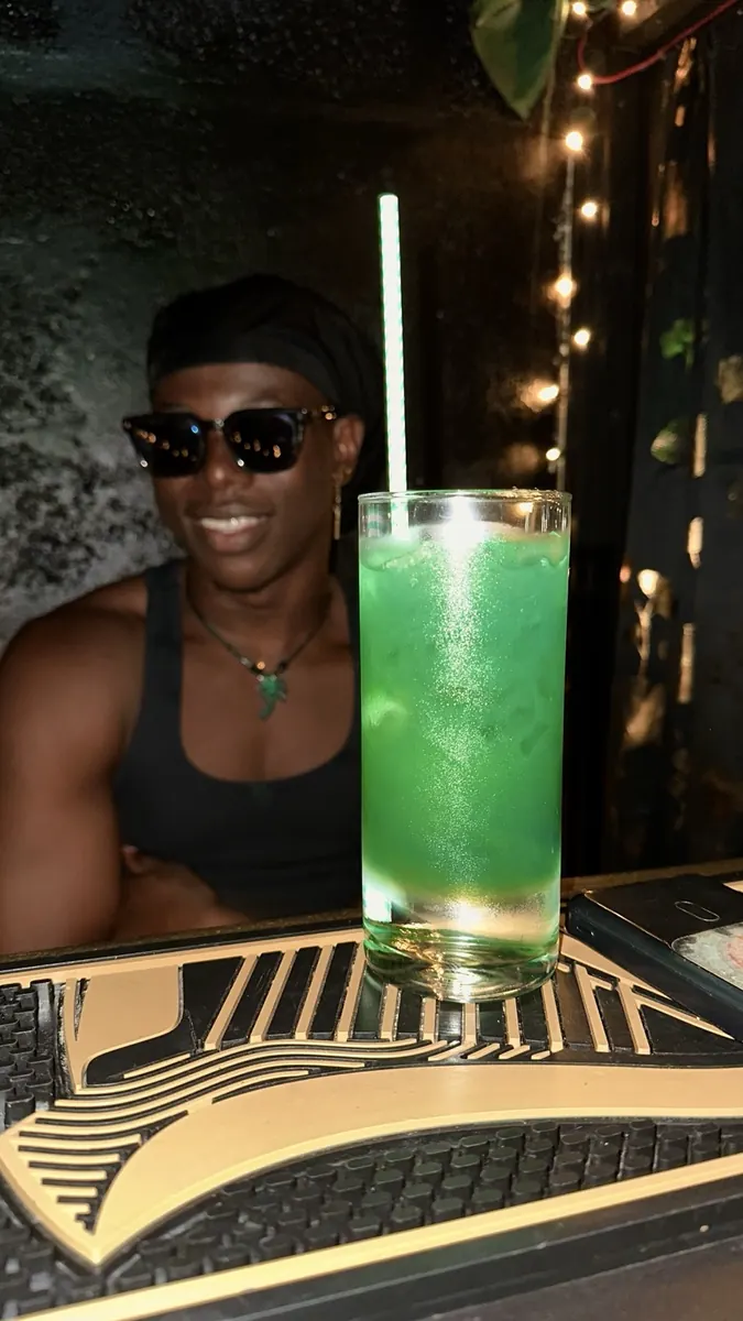 A green cocktail prepared at JustDior