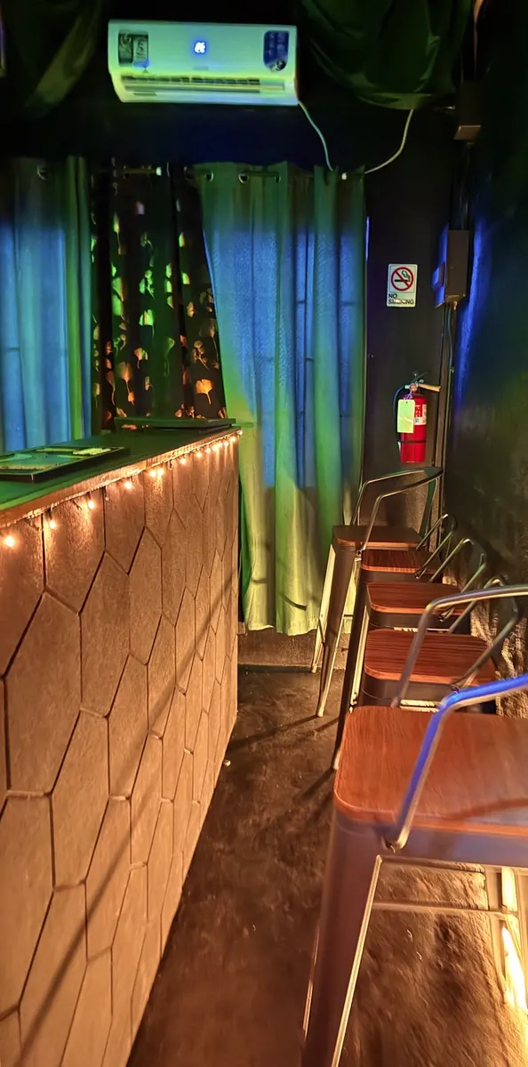 Bar stools and intimate seating inside JustDior